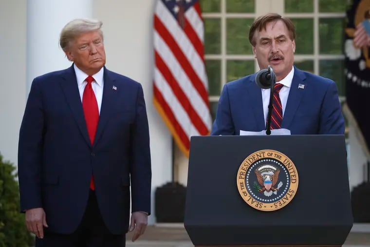 My Pillow CEO Mike Lindell spoke on March 30 as former President Donald Trump listened during a briefing about the coronavirus in the Rose Garden of the White House.