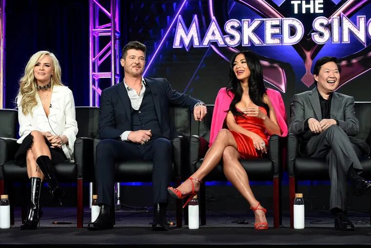 "The Masked Singer" panelists Jenny McCarthy, Robin Thicke, Nicole Scherzinger, and Ken Jeong during a session at the Television Critics Association's winter meetings in Pasadena, Calif., last week.