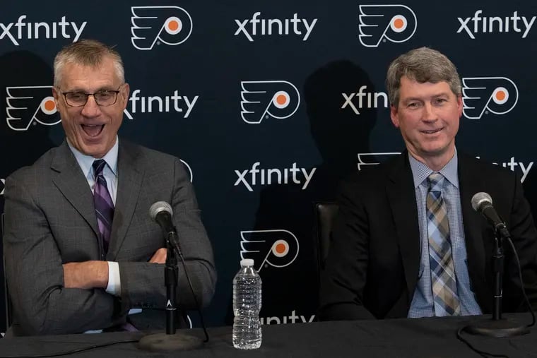 New Flyers general manager Chuck Fletcher (right) with club president Paul Holmgren, one of the men who hired him.