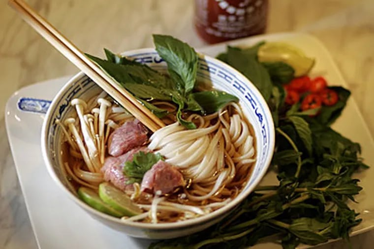 Vietnamese pho is fragrant with fresh herbs and chilies and pungent with fish sauce. (DAVID SWANSON / Staff Photographer)