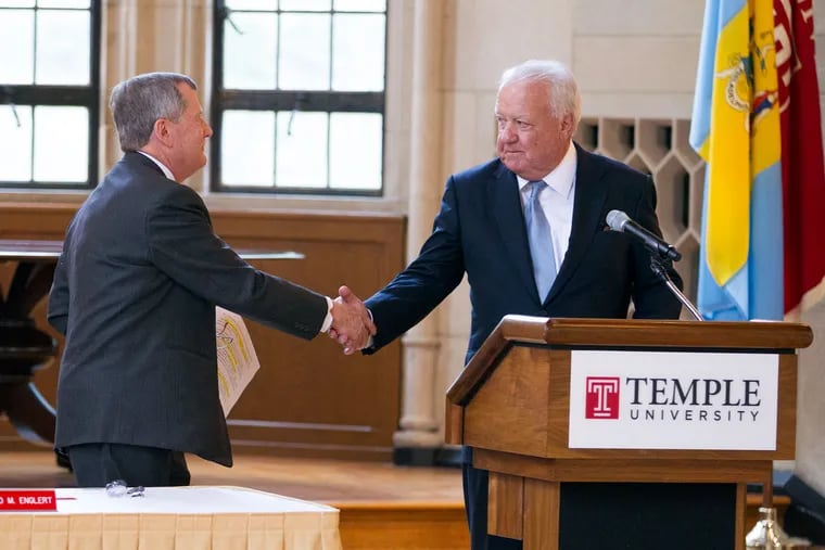 Richard M. Englert (left) with Patrick O’Connor, Temple University board of trustees chairman, at Thursday’s announcement. Englert will temporarily replace Neil D. Theobald as university president.