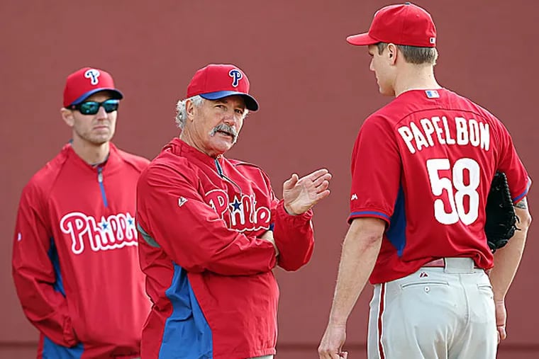 Phillies pitching coach Bob McClure and closer Jonathan Papelbon. (David Maialetti/Staff Photographer)