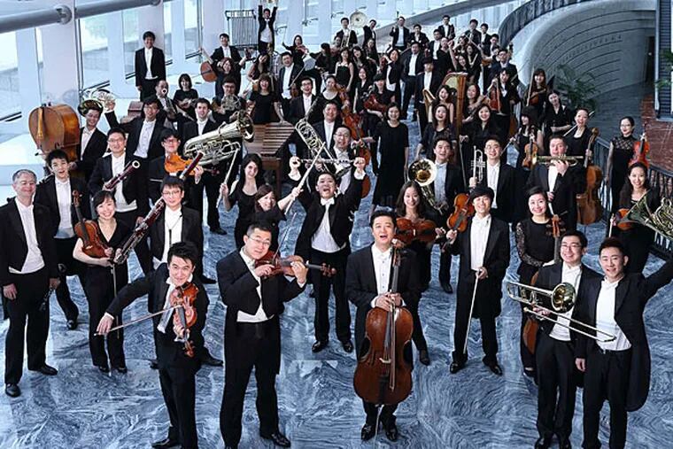 The four-year-old orchestra's members' average age is 30. The tour is of blue-chip venues, such as Chicago's Orchestra Hall, the Kennedy Center, New York's Alice Tully Hall, and the Kimmel. (WANG XIAOJING)