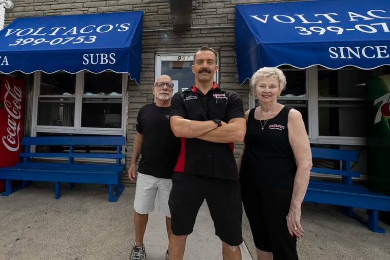 "What’s the point of doing all this if I can’t enjoy the fruits of my labor?" asks Jeff Taccarino (center), outside Voltaco's in Ocean City, N.J., with his parents, Joseph Taccarino Sr. and Victoria Taccarino. The parents will retire and the shop will close Oct. 9.