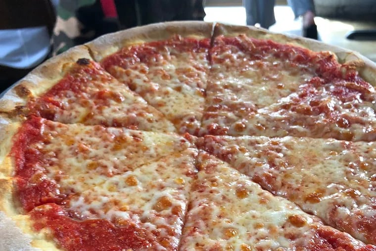 Pizza for $5 is a happy-hour deal at Chick's in South Philadelphia.
