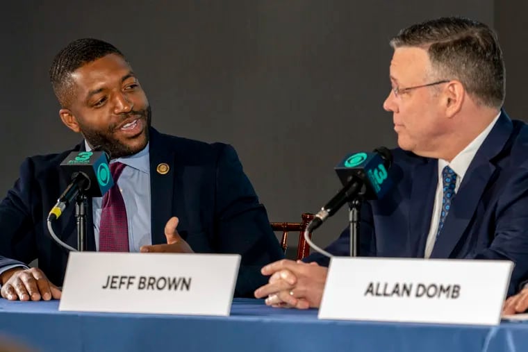 Candidates Amen Brown (left) and Jeff Brown (right) engage each other during a mayoral forum hosted by the Philadelphia Association of Black Journalists at the Museum of the American Revolution on Thursday.