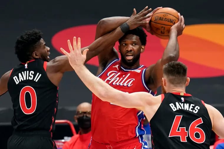 Joel Embiid committed six turnovers, including three on bad passes, against the Raptors during Tuesday's win.