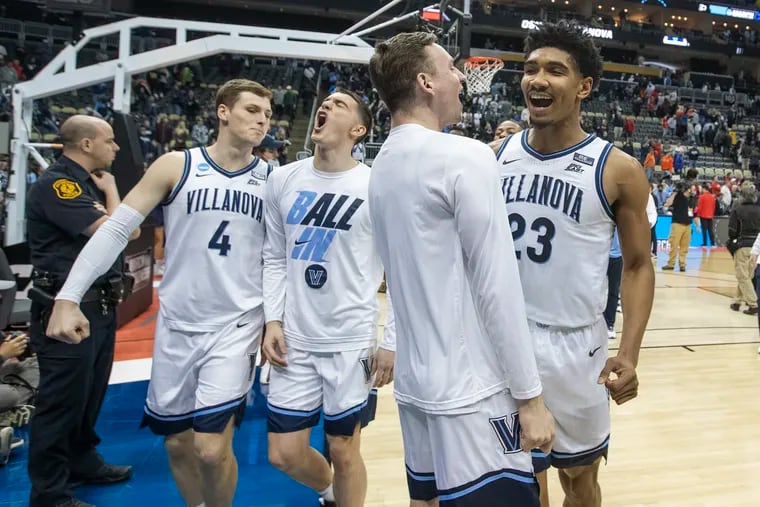 Chris Arcidiacono, Angelo Brizzi, Kevin Voigt, and Jermaine Samuels of Villanova celebrate their victory over Ohio State to get to the NCAA Sweet 16.