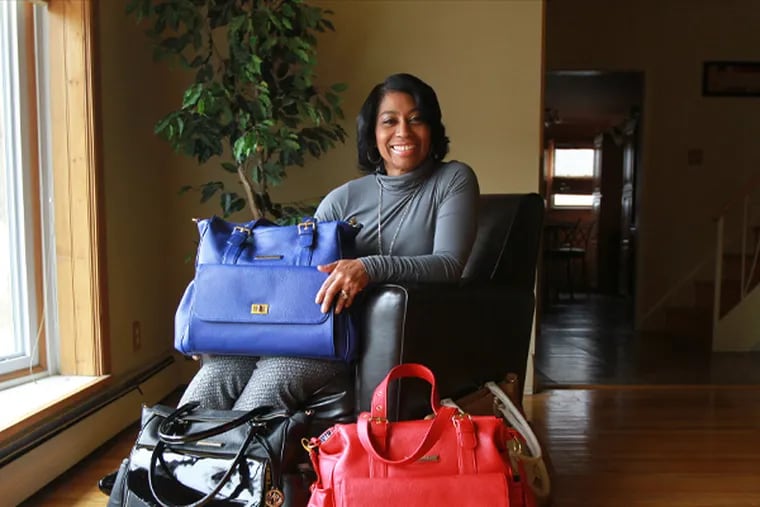 Sherrill W. Mosee and her minkeeblue travel and diaper bags in her Philadelphia home Thursday Jan. 2, 2014. (DAVID SWANSON/Staff Photographer)
