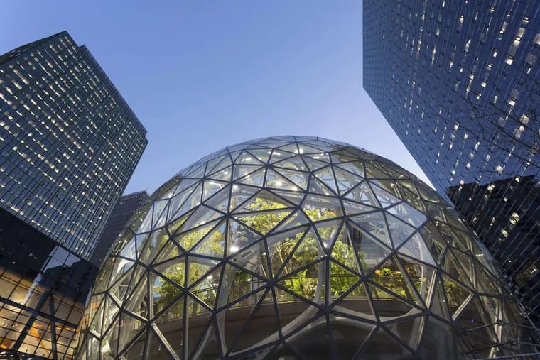 The Amazon Spheres under construction at the Amazon Urban Campus in the Belltown neighborhood of Seattle. Amazon has unveiled its 20 finalist cities in which to build its second headquarters.
