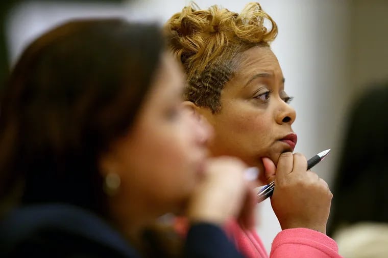 Councilwoman Cindy Bass, right, listens during city council hearing on the opioid crisis at City Hall in Philadelphia, PA on March 12, 2018. DAVID MAIALETTI / Staff Photographer