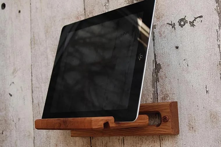 An iPad easel by Peg and Awl that can be used as desktop base or wall mount. $60. (Peg and Awl photo)