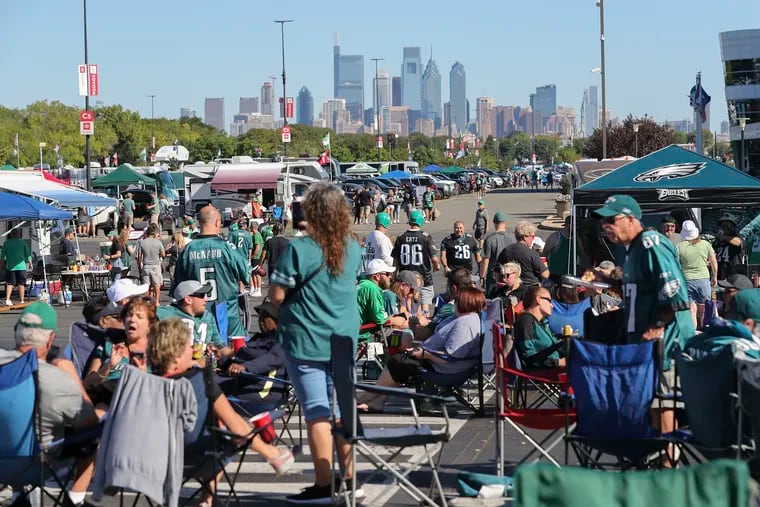 Fans tailgate in the Wells Fargo Center parking lot outside of Lincoln Financial Field before the Eagles home opener against the San Francisco 49ers in September.