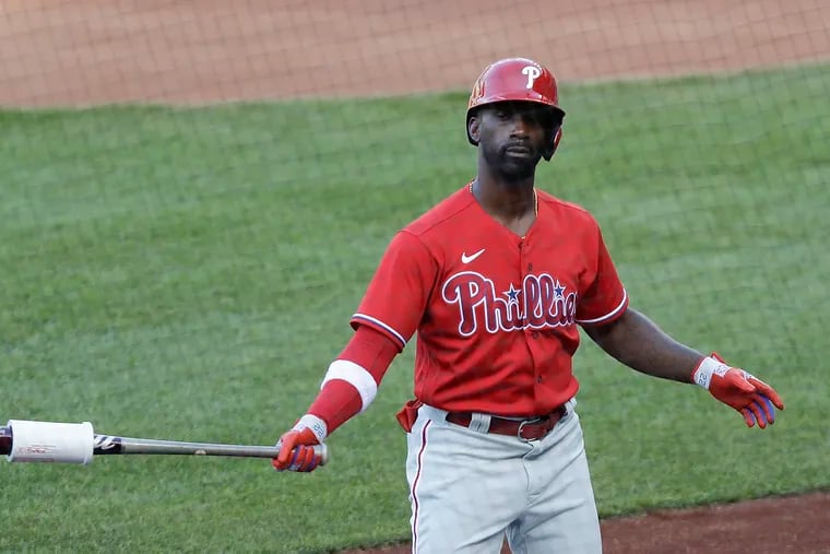 Phillies outfielder Andrew McCutchen warms up before batting against the Washington Nationals in a July 18 exhibition game at Nationals Park in Washington.