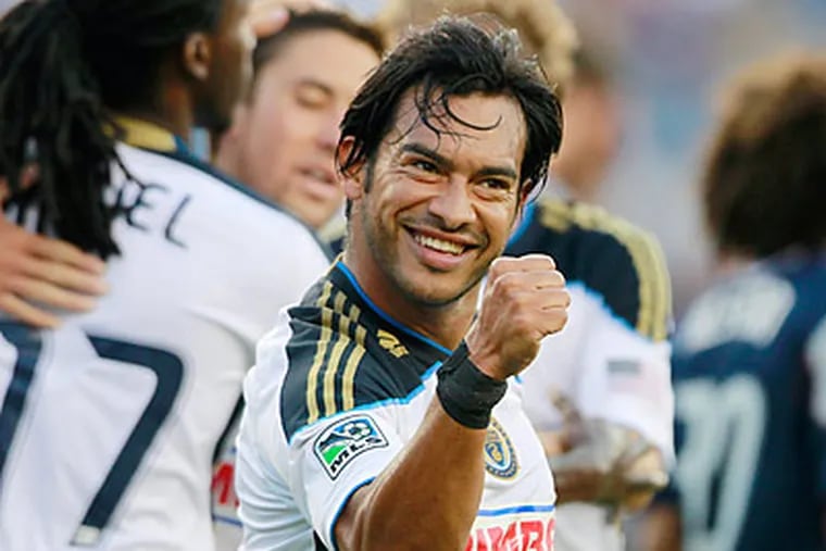 Carlos Ruiz scored the first goal in the Union's win over New England. (Michael Dwyer/AP)