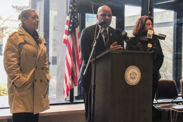 Mayor-elect Frank Gilliam and residents Sheila Hull-Freeman (left) and Carol Ruffu (right) claim victory in the state’s announcement that it would not seek to privatize Atlantic City’s water authority.