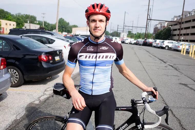 Bicyclist Karl Nelson was struck by a vehicle driven by a Whitemarsh Township officer earlier this month. No citations were issued, but it underscored how the suburbs lag in accommodating bicyclists. ED HILLE / Staff Photographer