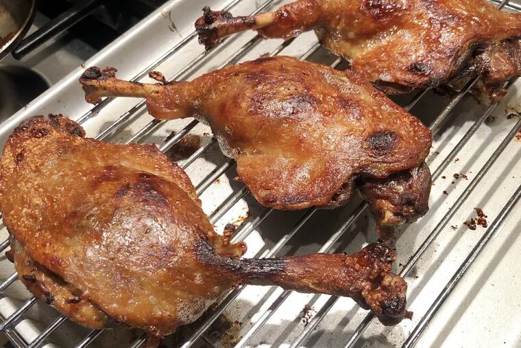 Duck confit is roasted to a crisp before being ensconced in a dish of beans and meats for cassoulet.