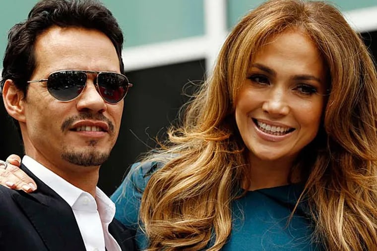 The divorce of Jennifer Lopez and Marc Anthony, seen here in 2011, has been finalized, 3 years after they split up. (MATT SAYLES / AP)