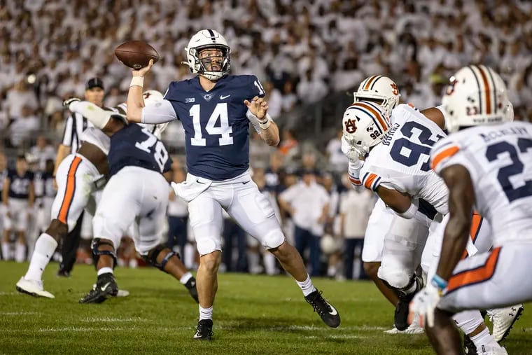 Penn State quarterback Sean Clifford (14) throws a touchdown pass to Jahan Dotson, not pictured, during last Saturday's game against Auburn.