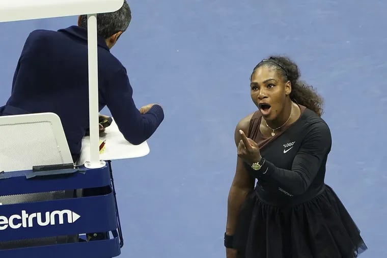 FILE – In this Saturday, Sept. 8, 2018, file photo, Serena Williams argues with the chair umpire during a match against Naomi Osaka, of Japan, during the women's finals of the U.S. Open tennis tournament at the USTA Billie Jean King National Tennis Center, in New York. Some black women say Serena Williams' experience at the U.S. Open final resonates with them. They say they are often forced to watch their tone and words in the workplace in ways that men and other women are not. Otherwise, they say, they risk being branded an "Angry Black Woman." (Photo by Greg Allen/Invision/AP, File)