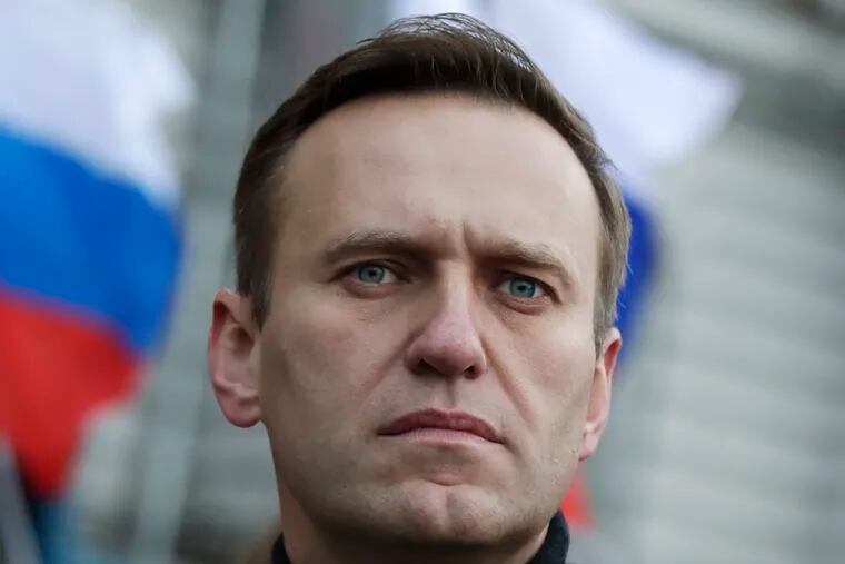 In this file photo taken on Saturday, Feb. 29, 2020, Russian opposition activist Alexei Navalny takes part in a march in memory of opposition leader Boris Nemtsov in Moscow. The German hospital treating Navalny says tests indicate that he was poisoned.