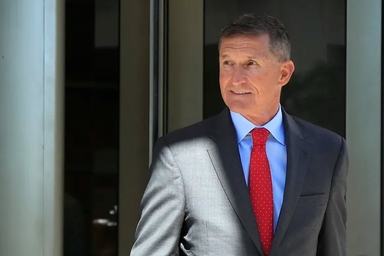 FILE - In this July 10, 2018 file photo, former Trump national security adviser Michael Flynn leaves federal courthouse in Washington, following a status hearing. (AP Photo/Manuel Balce Ceneta)