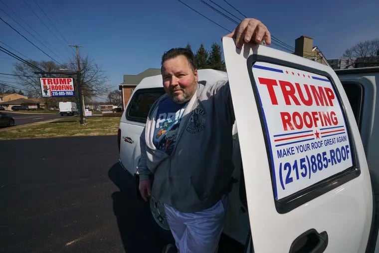 Joe Wade, shown here in front of his new office in Willow Grove, Pa., named his roofing company after Donald Trump.  His slogan:  "Make Your Roof Great Again."