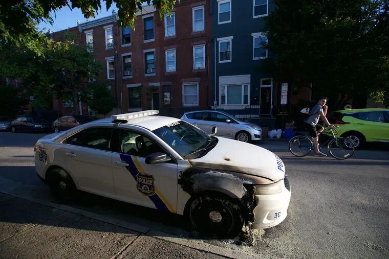 A police car was burned at 11th and Wharton streets in South Philadelphia near the Third District police precinct.