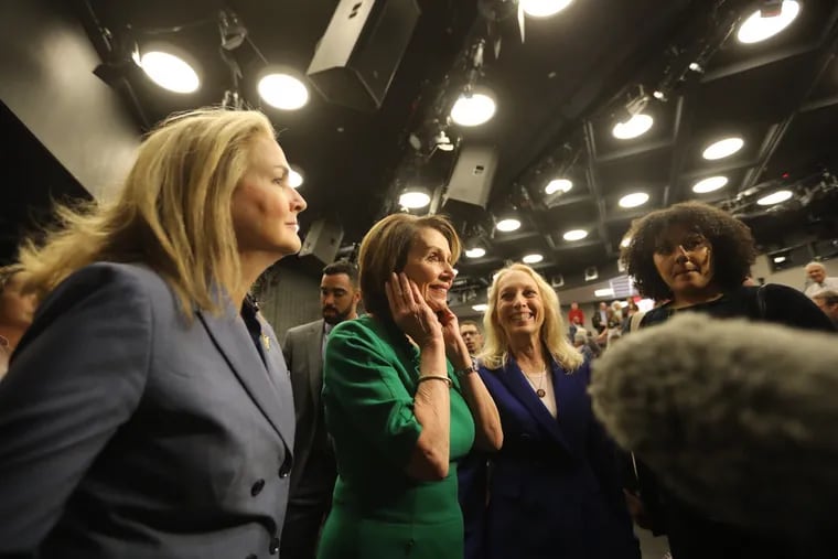 Speaker Nancy Pelosi speaks about college affordability and post-secondary career opportunities at Delaware County Community College Friday with Reps.Madeleine Dean, left, and Mary Gay Scanlon, right, both Pennsylvania Democrats.
