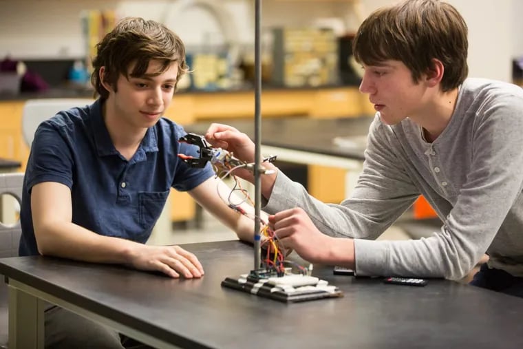 Sophomore students at Germantown Friends School, Leo Kastenberg, left, and Will Hagele right, demonstrate their latest computer science project. JESSICA GRIFFIN / Staff Photographer.