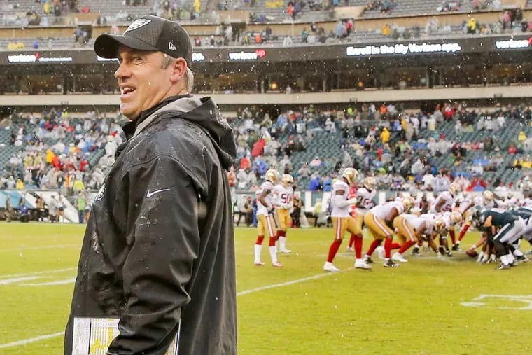 Eagles coach Doug Pederson smiles at the end of the game against the 49ers.