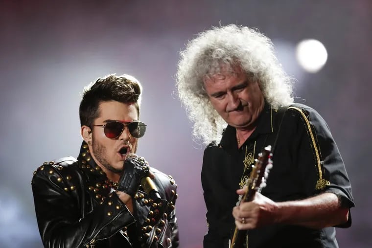 Adam Lambert (left) and Brian May performing as Queen + Adam Lambert, n 2015 in Brazil.