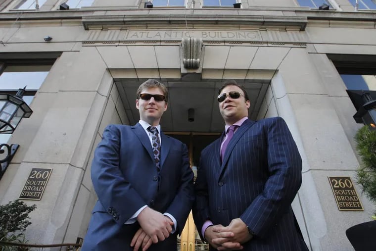 Michael Pestronk, left, and his brother, Matthew Pestronk in front of their apartment conversion project at the Atlantic Building, at Broad and Spruce Streets. This photograph was shot in October, 2012, just as the brothers were in a rancorous dispute with Philadelphia’s busilding trades over open-shop construction at their Goldtex project at 12th and Pearl streets. (ALEJANDRO A. ALVAREZ / STAFF PHOTOGRAPHER )