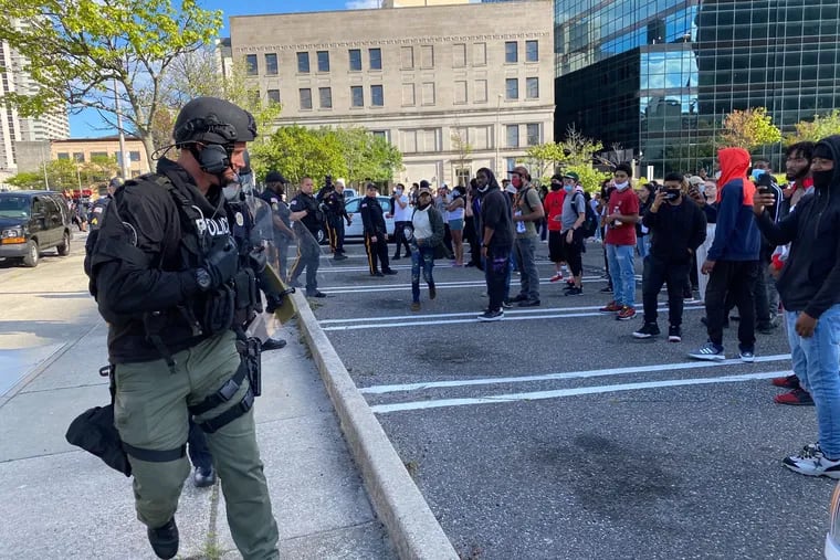 Police and protesters in the City Hall parking lot in Atlantic City, N.J., on Sunday, May 31, 2020.