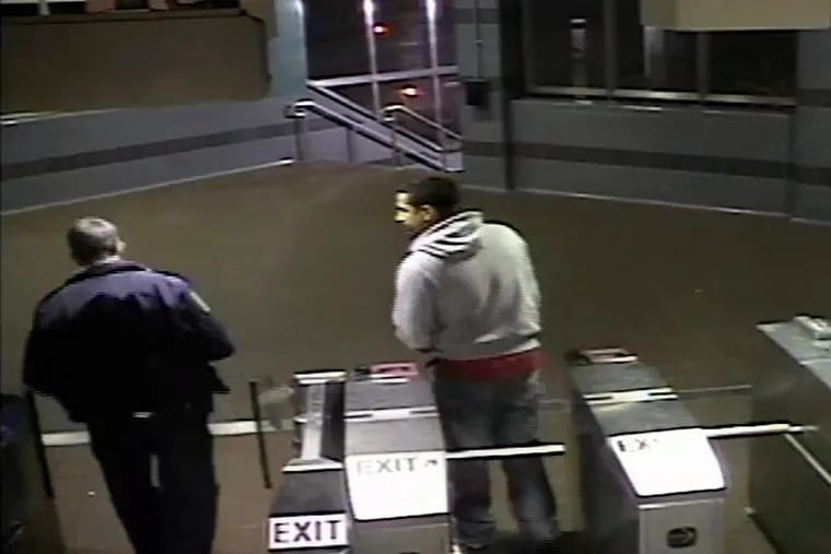 A still from surveillance video shows the unnamed SEPTA officer escorting 24-year-old Omar Lopez out of the Huntingdon Station. Outside, they would get into an altercation in which the officer Tased Lopez 10 times to subdue him. Lopez died.