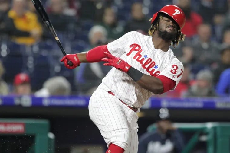 Center fielder Odubel Herrera was removed from the Phillies' 40-man roster on Tuesday.