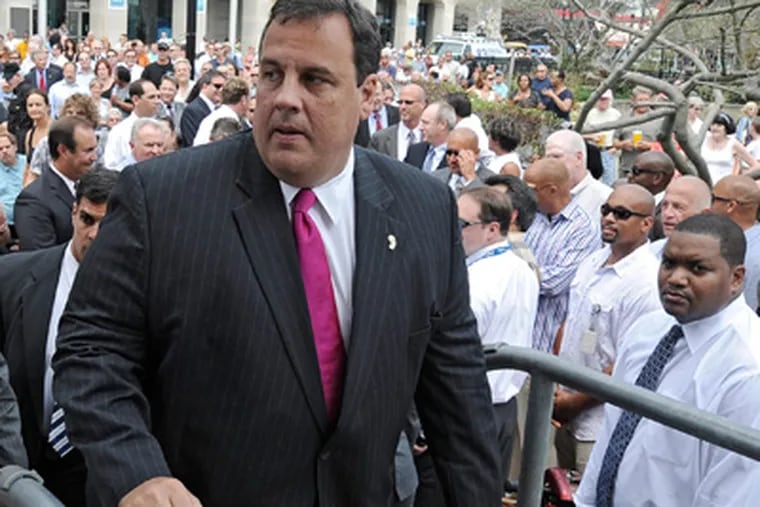 Gov. Christie heads to the stage in front of Boardwalk Hall for a press conference announcing that the state was taking control of the gambling and entertainment districts in Atlantic City. (Clem Murray / Staff Photographer)