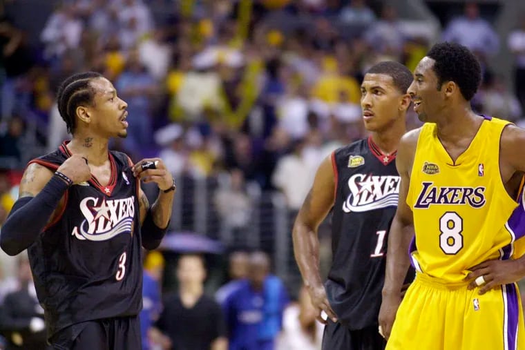 In this June 8, 2001 photo, the Sixers' Allen Iverson (left) argues with the Los Angeles Lakers' Kobe Bryant.