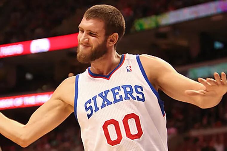 76ers starting center Spencer Hawes has been hindered by back and Achilles' problems. (Steven M. Falk/Staff file photo)