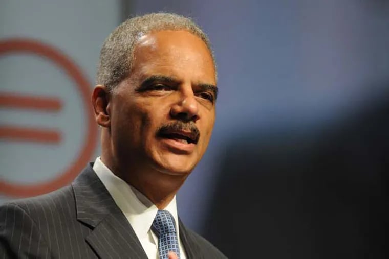 US Attorney General Eric Holder addresses the 2013 National Urban League Conference in Philadelphia July 25, 2013.  The name of the conference this year is Redeem the Dream.  ( CLEM MURRAY / Staff Photographer )