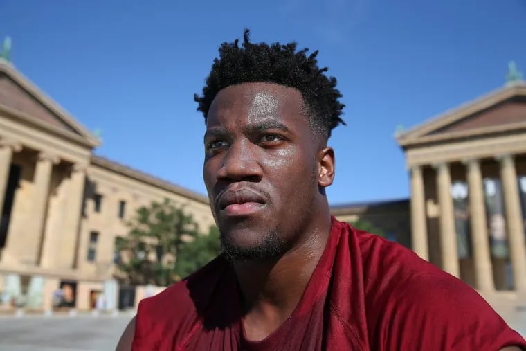 Temple senior DL Jacob Martin pauses after the Owls worked out on the Art Museum steps in Philadelphia on June 28.