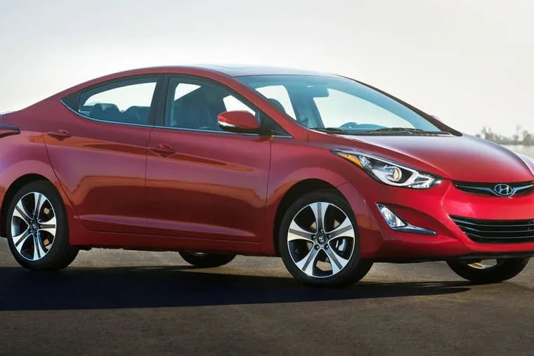 The 2015 Hyundai Elantra carries the same design as its predecessors, but handles and accelerates better.
