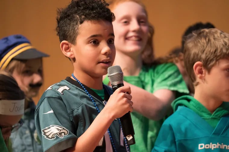 Andrew Luber-Solic is the boy (center)  speaks about the importance of the First Amendment as part of the he team from Glenwood Elementary School, one of the 10 finalists in the PECO Citizenship Challenge on Dec. 12, 2019 at the National Constitution Center.