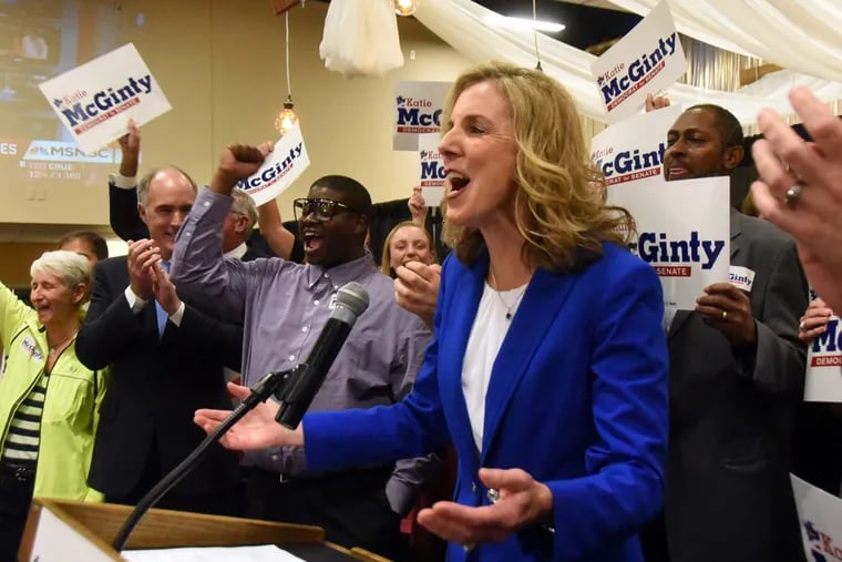 Katie McGinty talks to supporters following her victory in the Democratic primary for U.S. Senate. U.S. Sen. Bob Casey is at far left.