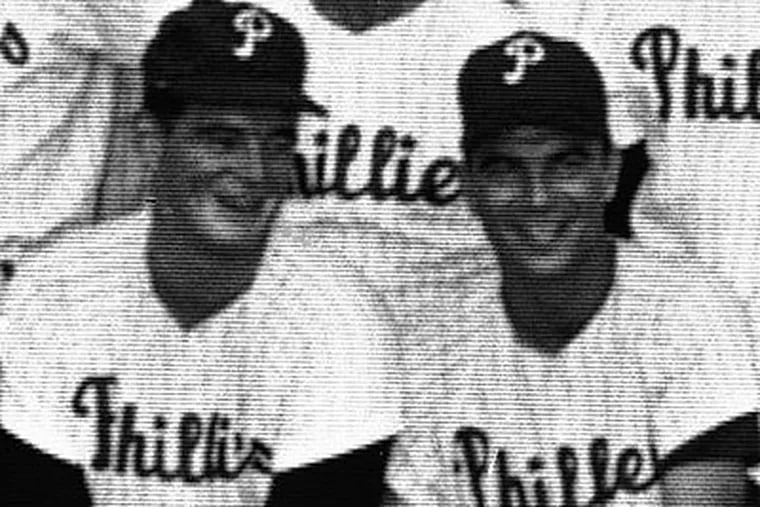 Dennis Bennett, left, and John Callison, pose for a team picture in 1964. (AP file photo)