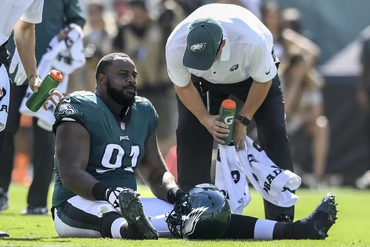 Eagles star defensive tackle Fletcher Cox was taken out of the game with a calf injury, one of the many injuries the defense had to endure.