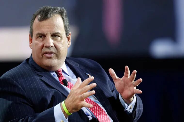 Gov. Christie has been talking law and order recently, pointing to his time as a U.S. attorney and accusing President Obama of a laxness about crime and the killing of police officers. (JIM COLE/Associated Press)
