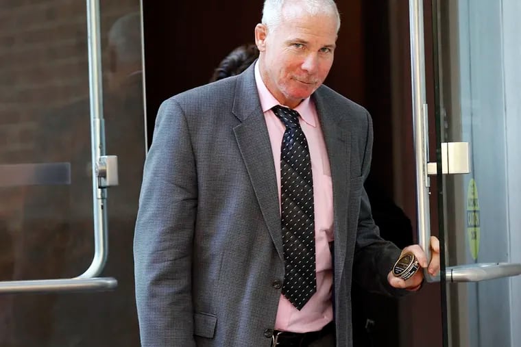 Ironworkers member James Walsh leaves court after pleading guilty on Tuesday, Sept. 23, 2014.  ( YONG KIM / STAFF PHOTOGRAPHER )