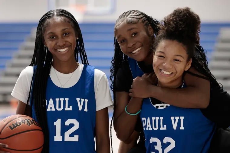Paul VI High School girls' basketball team seniors Brooke Barnes (12), Shariah Baynes (2), and Eva Andrews (32) are heading to separate Division I colleges next season.